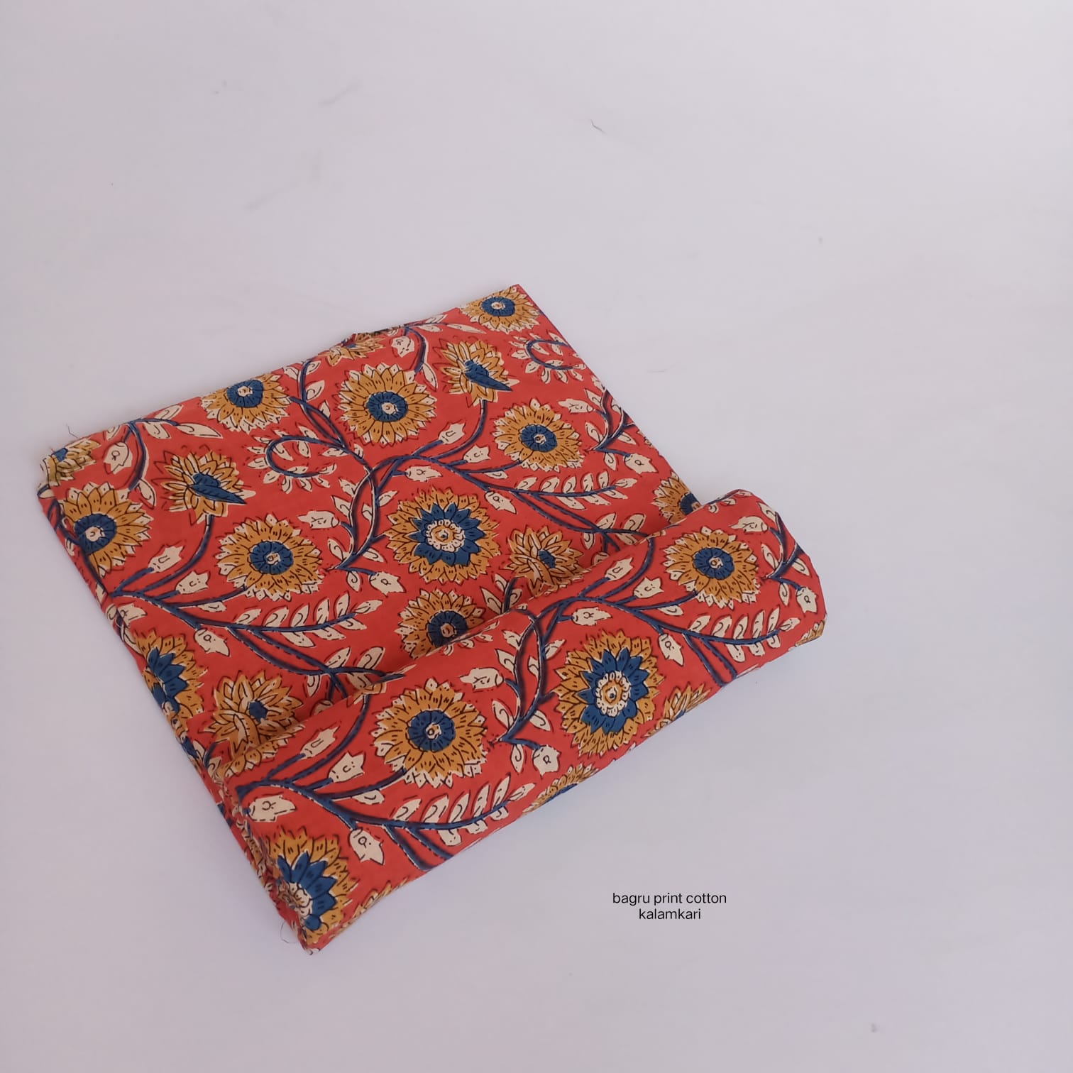 Orange and mustard floral jaal Bagru handblock cotton fabric, natural dyed wholesale textile by Fabtexs
